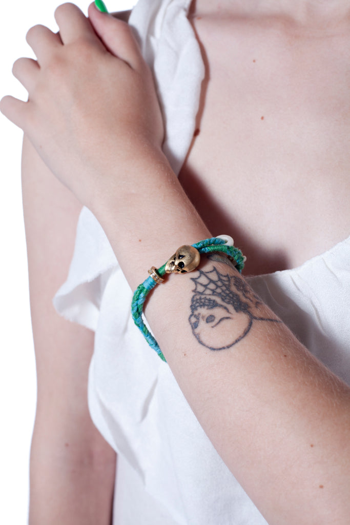 Disney Couture Pirates of the Caribbean Braided Skull Bracelet - Pink